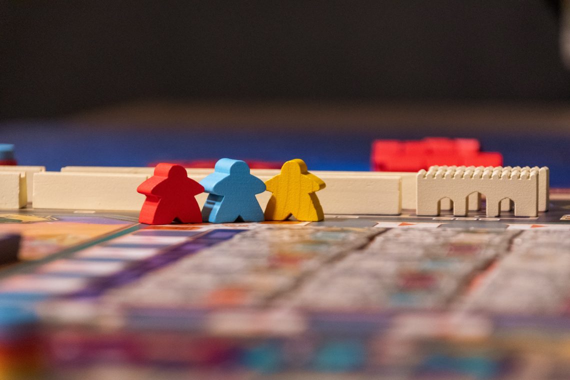 Meeples on a board